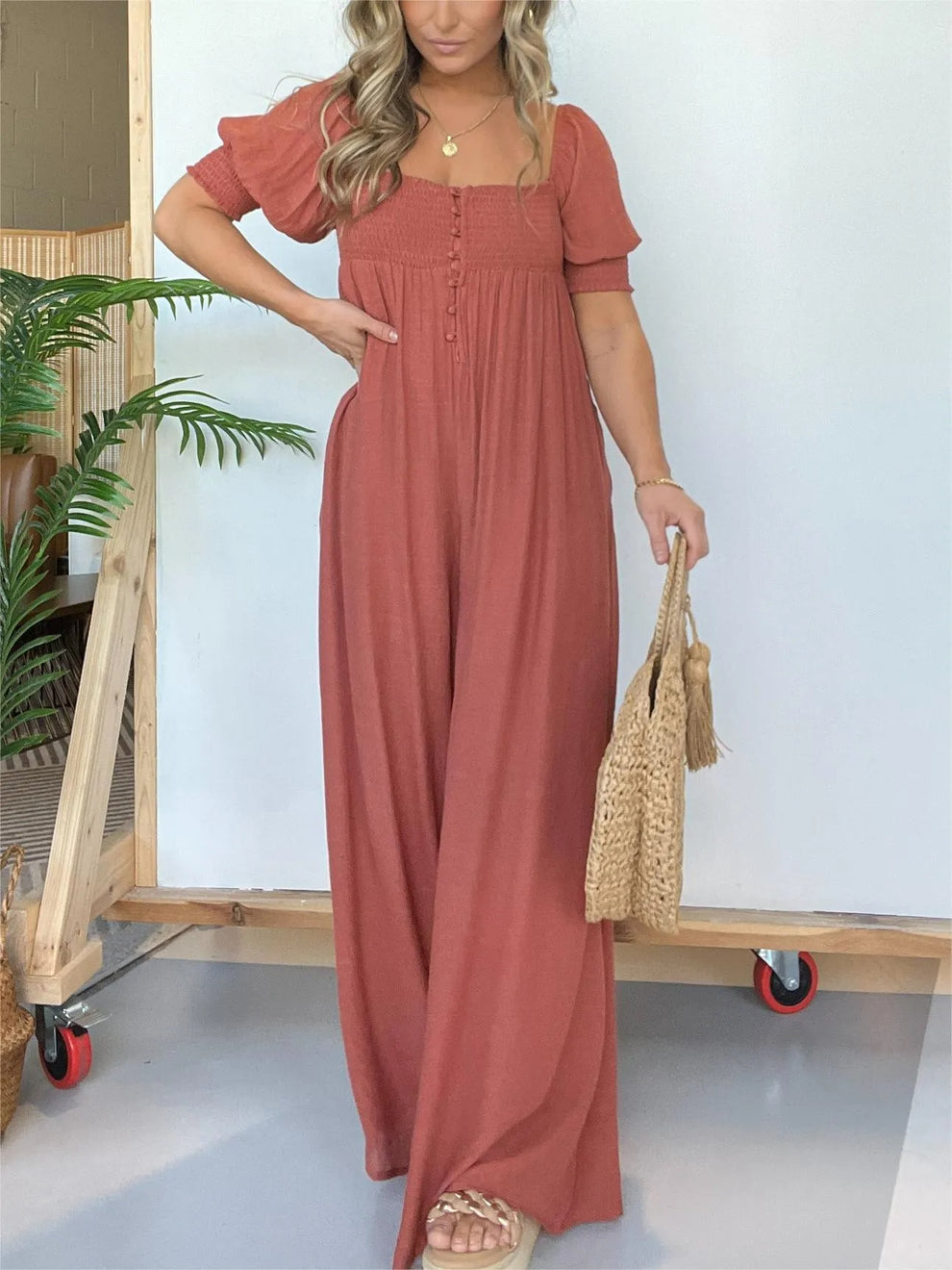 Fulvia Sessa™ Jumpsuit szögletes nyakkivágással és gombokkal